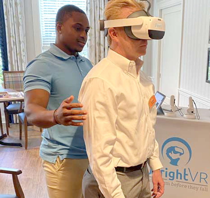 Clinic Therapist helping his patient with VR Therapy